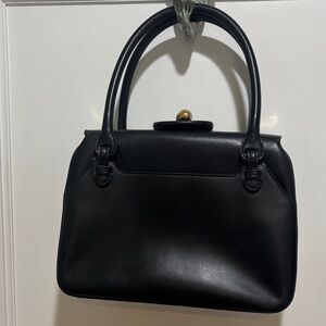 Gucci Vintage Gold Label Black Handbag with gold accents